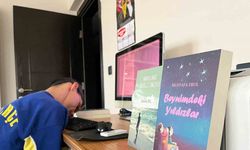 Ellerini kullanamayan Erol, burnuyla 328 sayfalık kitap yazdı